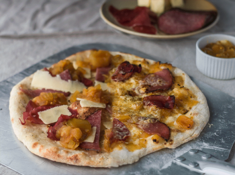 Marrow chutney, salami and strong mature cheddar pizza, topped hot, or cold